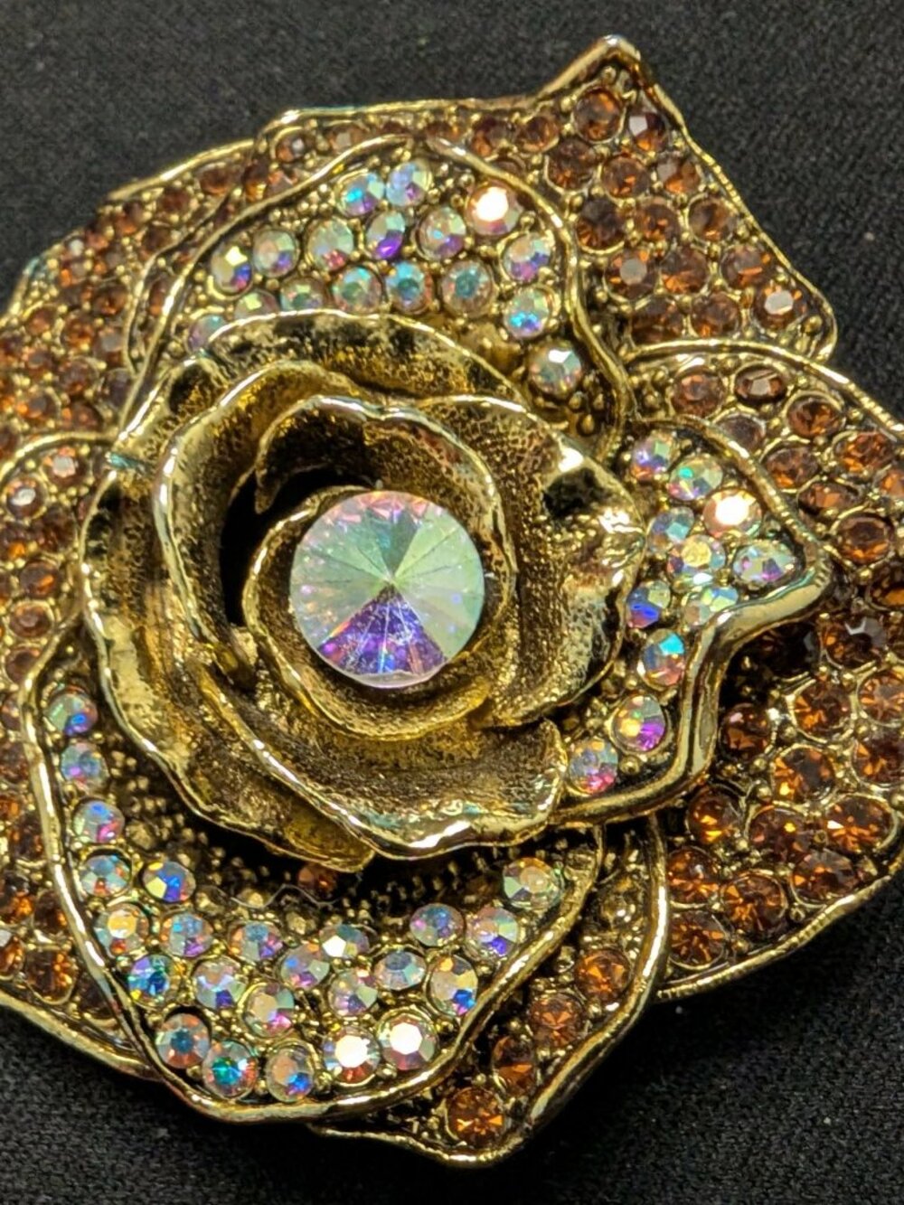 Vintage crystal-covered flower brooch